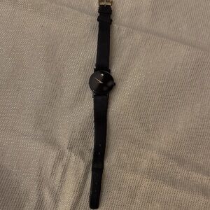 Movado Black Gold Tone Accents  Women
Needs New Battery  Selling As Is